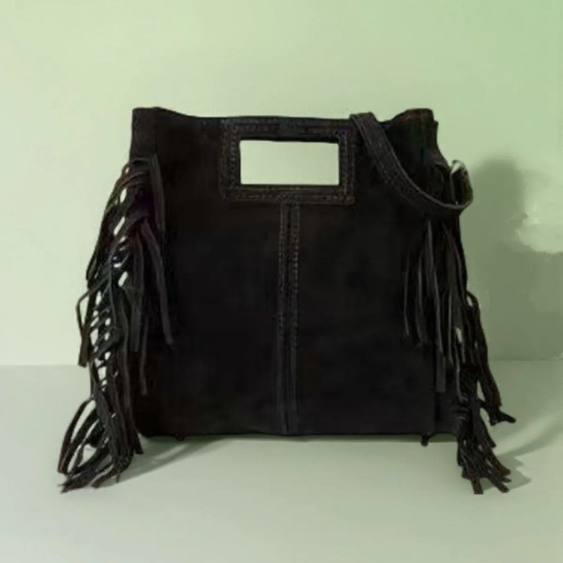 Sac porté main en daim muni d'une bandoulière Sac porté main en daim muni d'une bandoulière